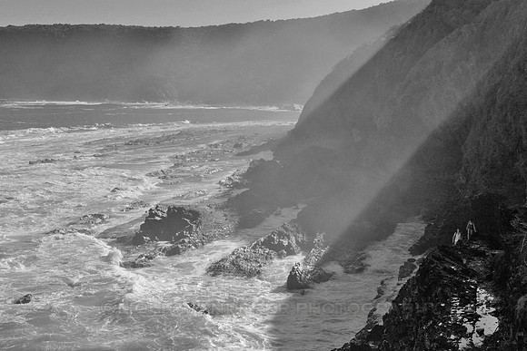 Hikers on seaside rocks