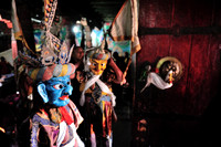 Monks wearing masks and costumes