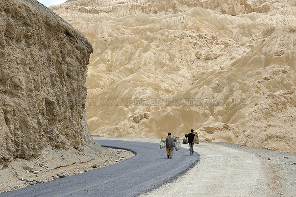Men carrying supplies