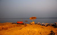 Sadhu sitting by Ganges river side