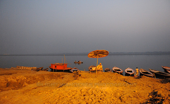 Sadhu sitting by Ganges river side