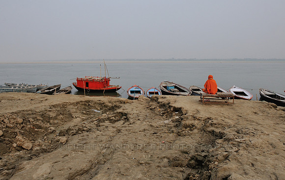 Sadhu sitting by the Ganges river