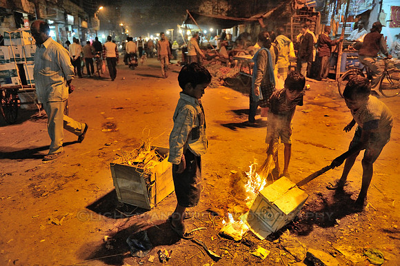 Kids burning garbage in the street