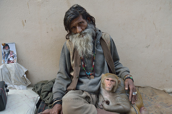 Sadhu with pet monkey