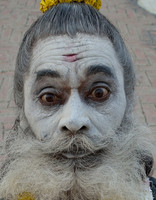 Sadhu with face painted white