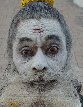 Sadhu with face painted white