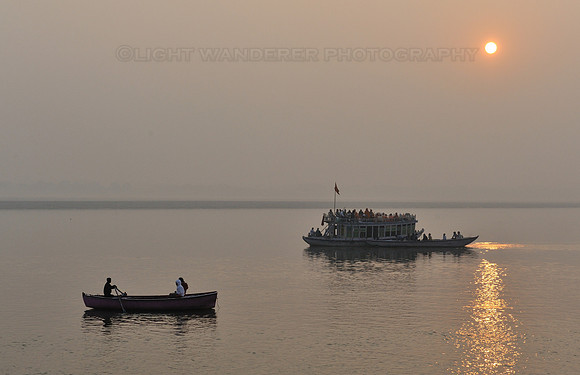 Full river boat on Ganges river