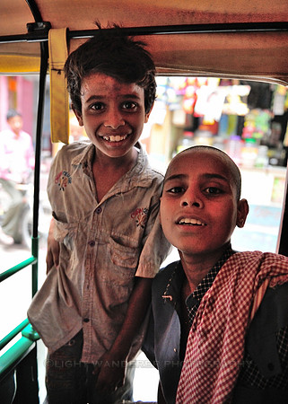 Two boys in autoriksha