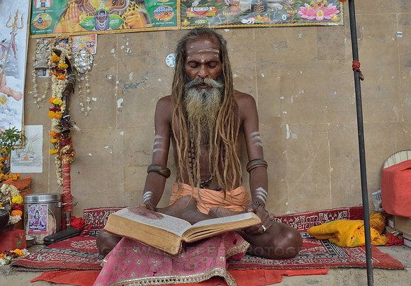 Sadhu reading holy texts