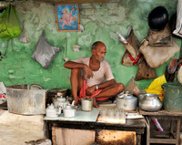 Chai wallah with tea making equipment