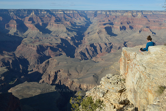 Young artist drawing a picture of Grand Canyon