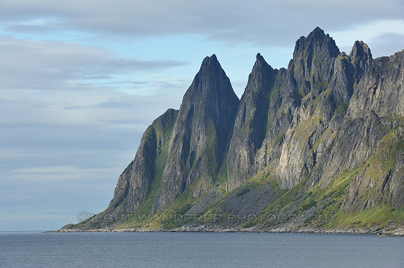 Dramatic rock wall, side of fjord