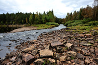 Smaller river joins Muonionjoki-river in Lapland
