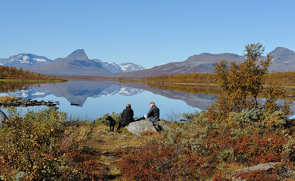 Couple with black dog
