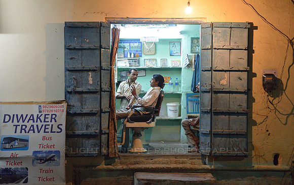 Barber and a client in discussion