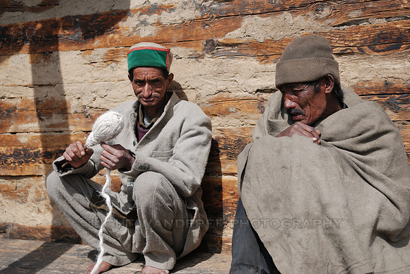 Two men spring sunshine sitting outdoors