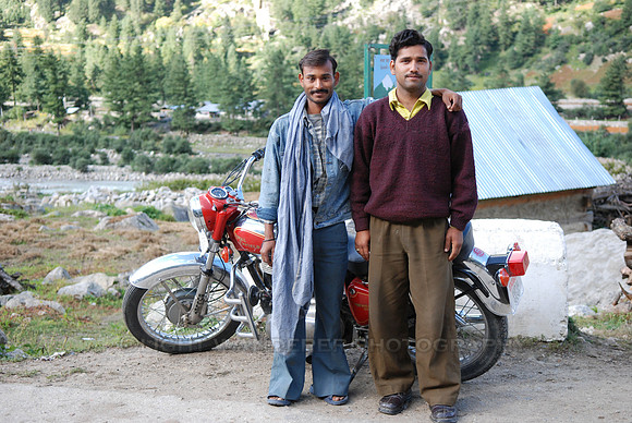 Two friends with Enfield Bullet motorbike