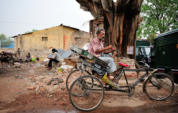 Bicycle rikshaw driver waiting for next customer