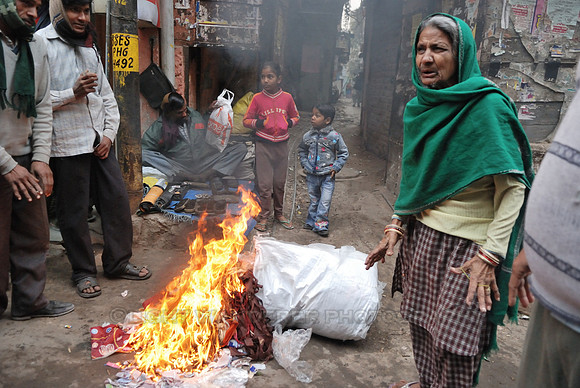 Sack full of clothes burning