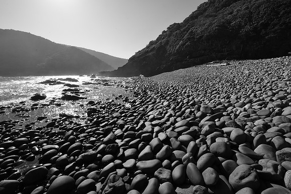 Beach covered by round stones