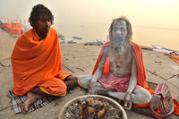 Two sadhus on Ganges river side