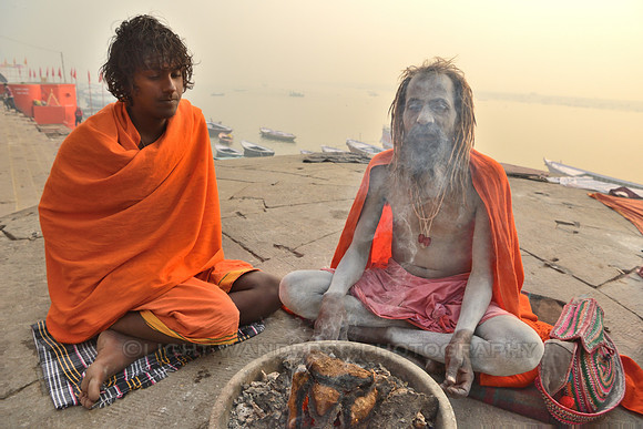 Two sadhus on Ganges river side