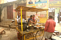 Street food cart in front of Varanasi school
