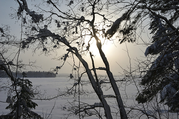 Frozen lake, midday sun